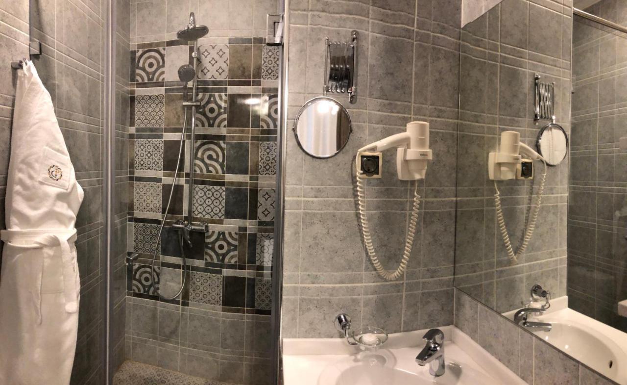 Grace Point Hotel Astana Quarto foto