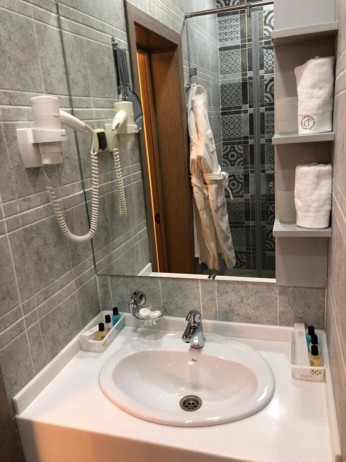 Grace Point Hotel Astana Quarto foto
