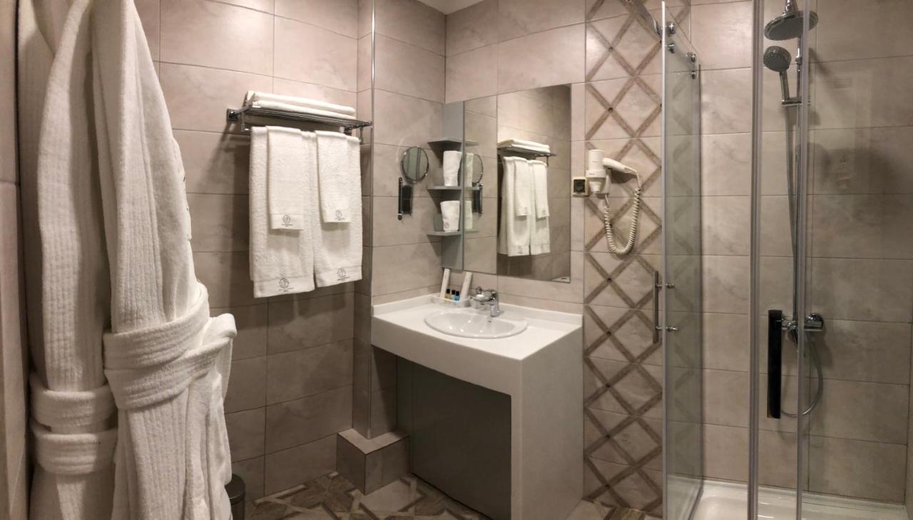 Grace Point Hotel Astana Quarto foto