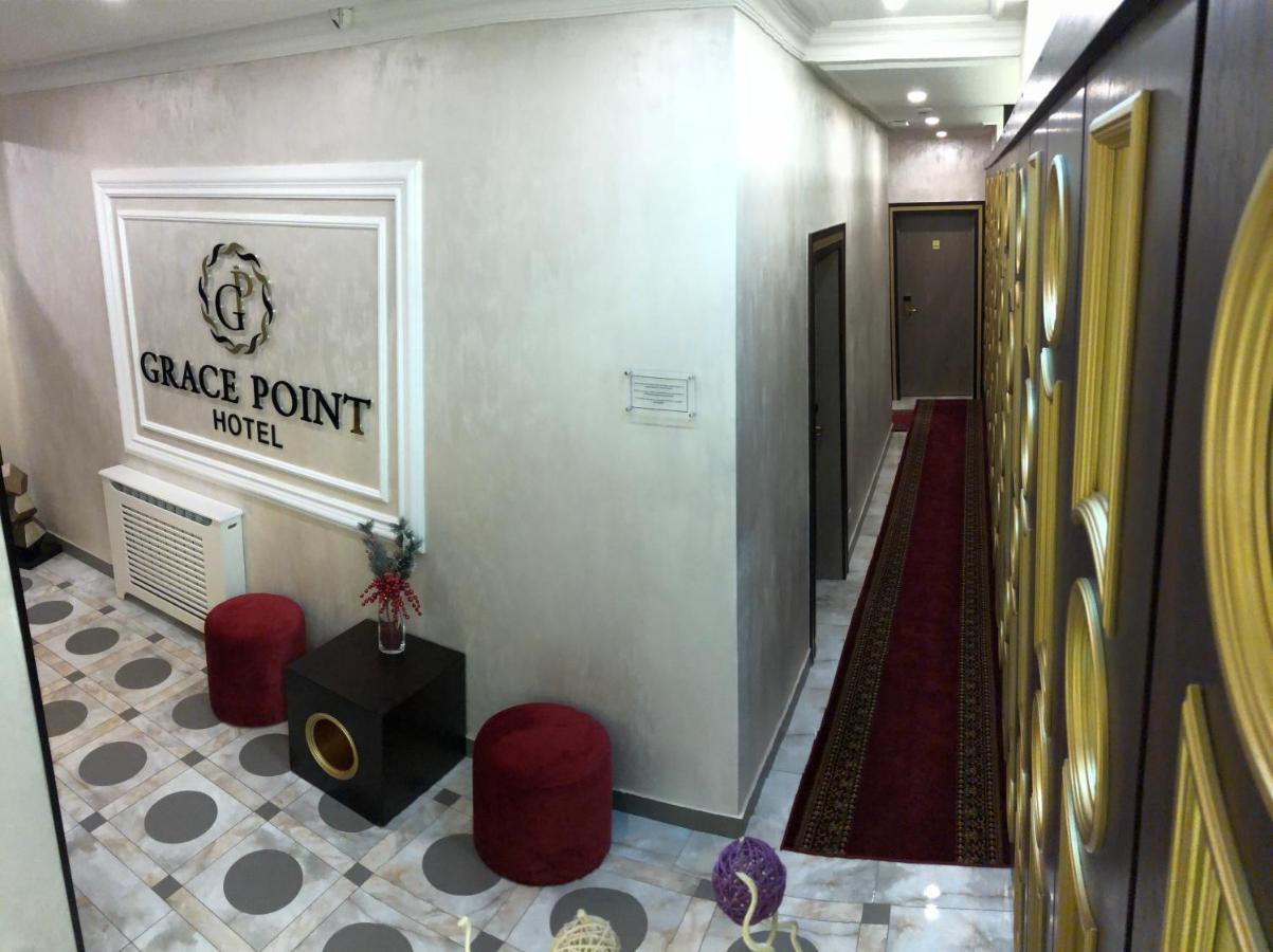 Grace Point Hotel Astana Quarto foto