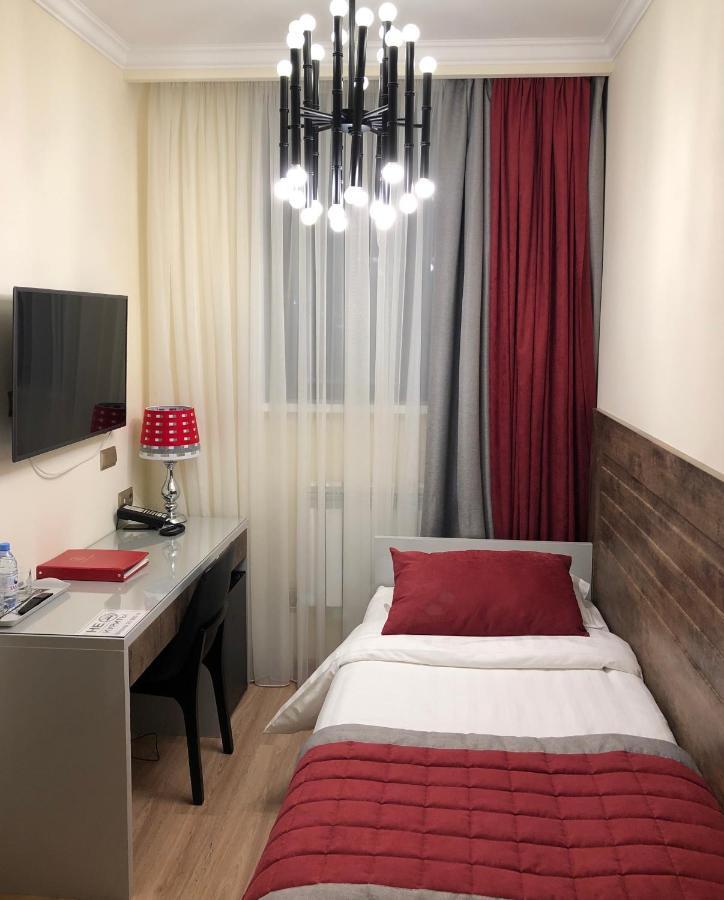 Grace Point Hotel Astana Quarto foto
