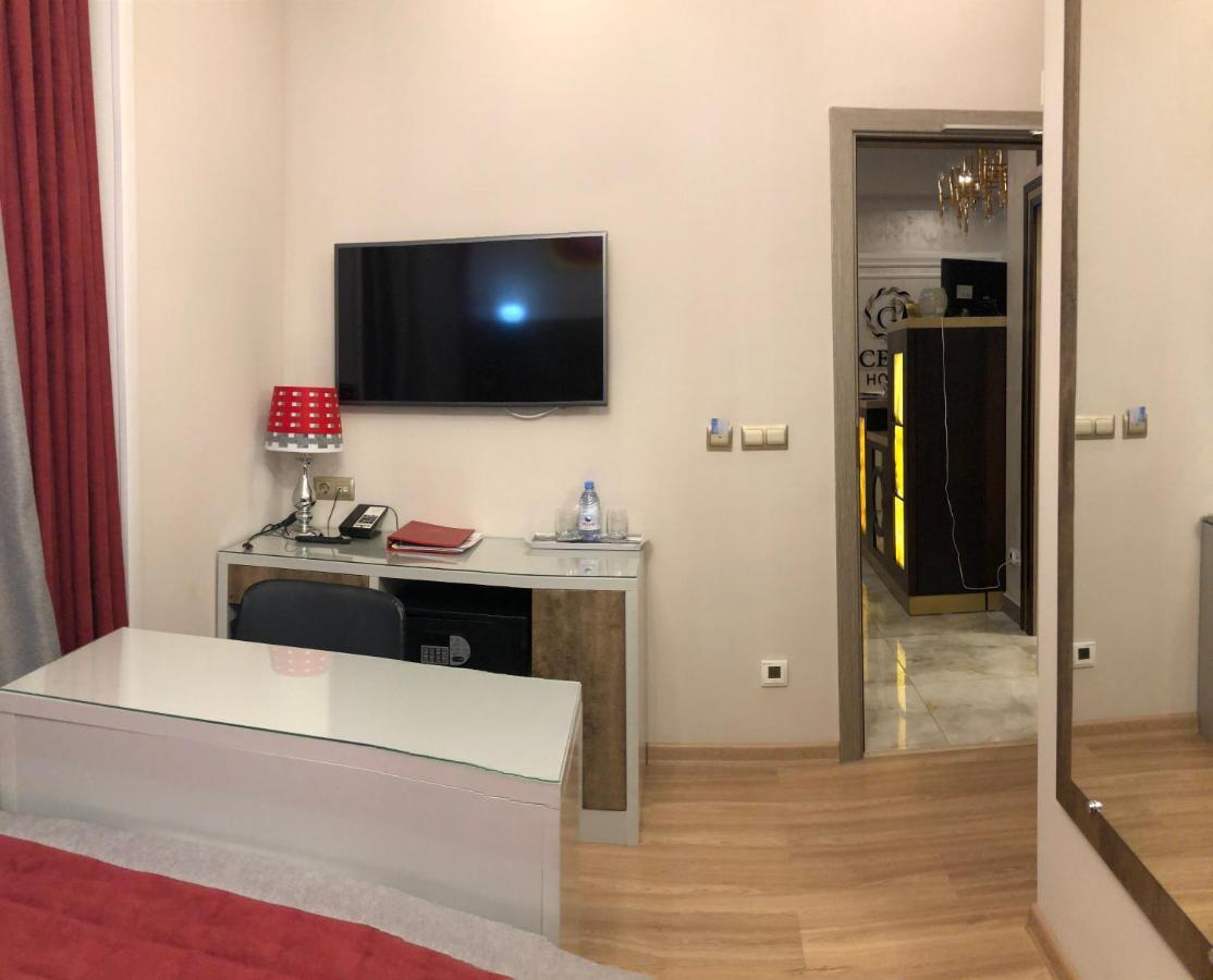 Grace Point Hotel Astana Quarto foto