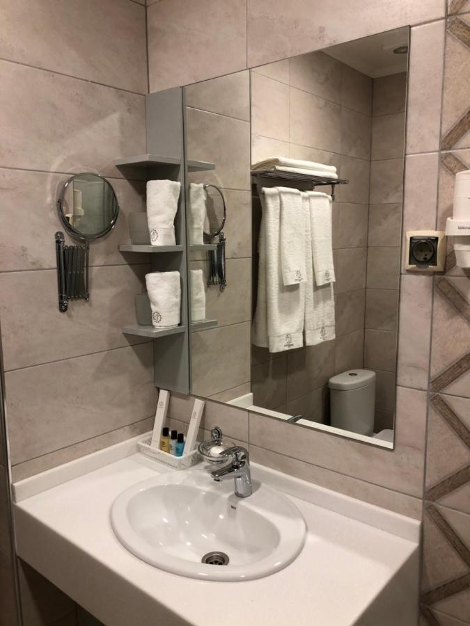 Grace Point Hotel Astana Quarto foto