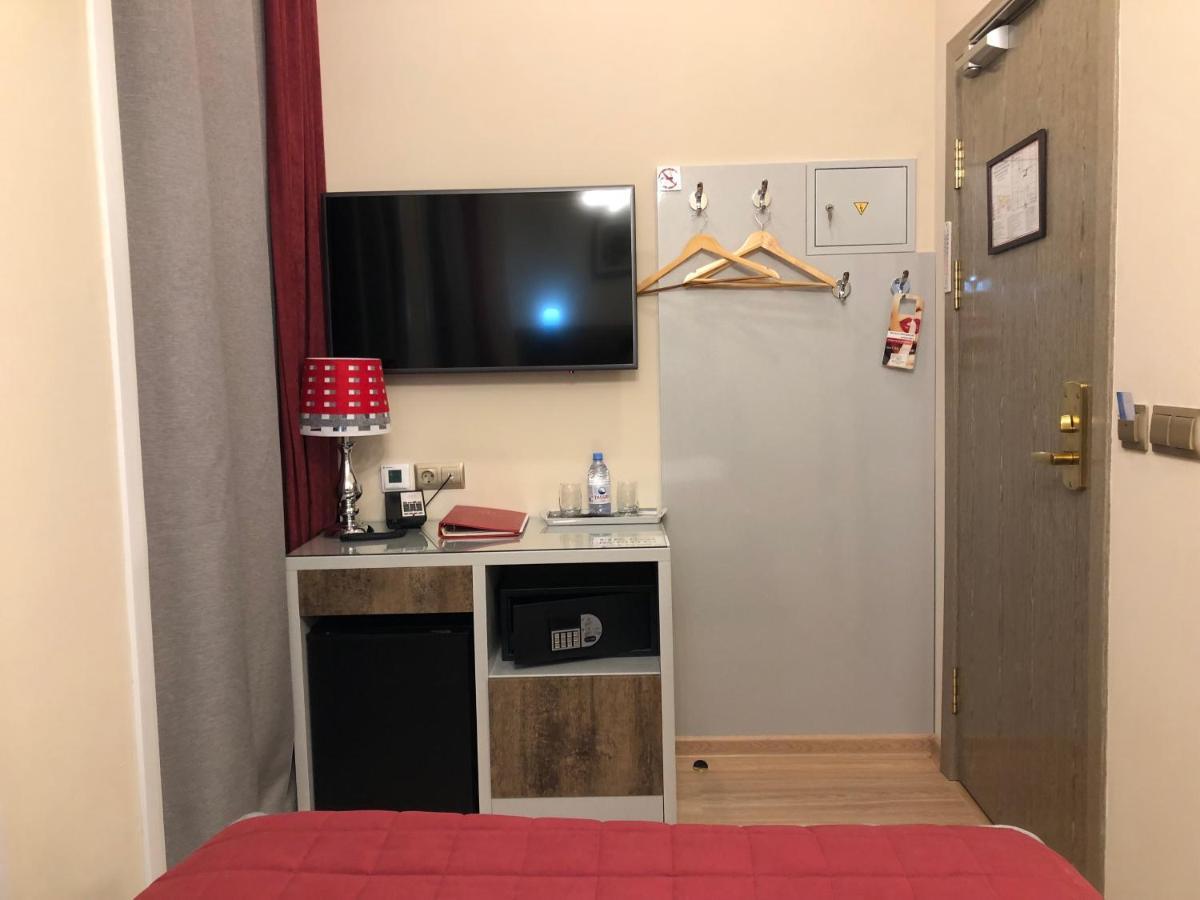 Grace Point Hotel Astana Quarto foto